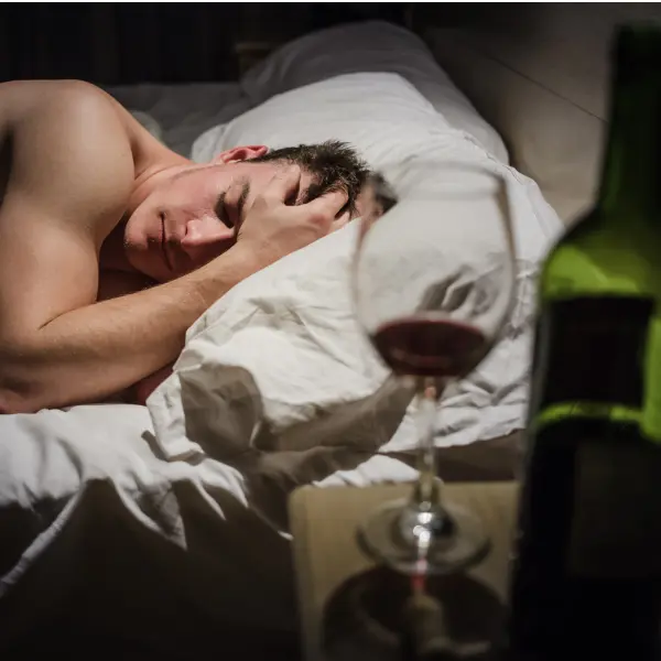 How do various drugs affect REM sleep?